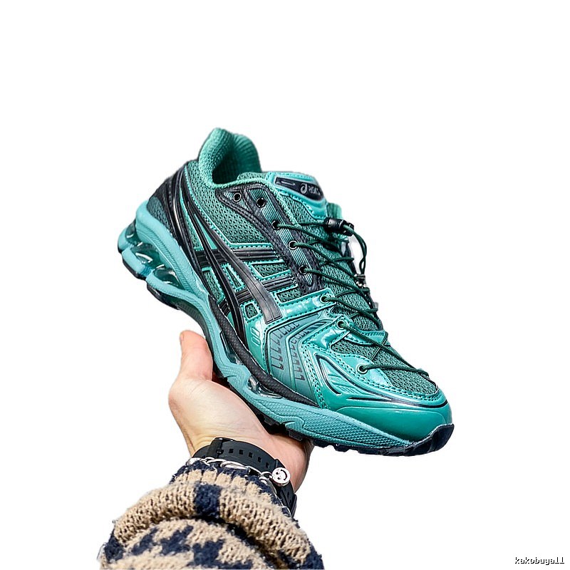 ASICS retro-style dark green sports shoes
